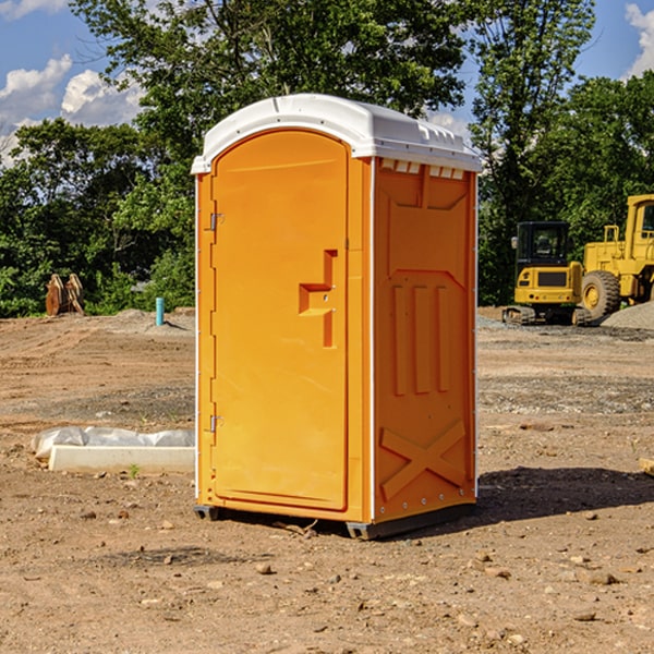 how often are the porta potties cleaned and serviced during a rental period in Navarre